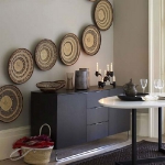 handwoven-baskets-and-bowls-wall-art-in-diningroom1.jpg